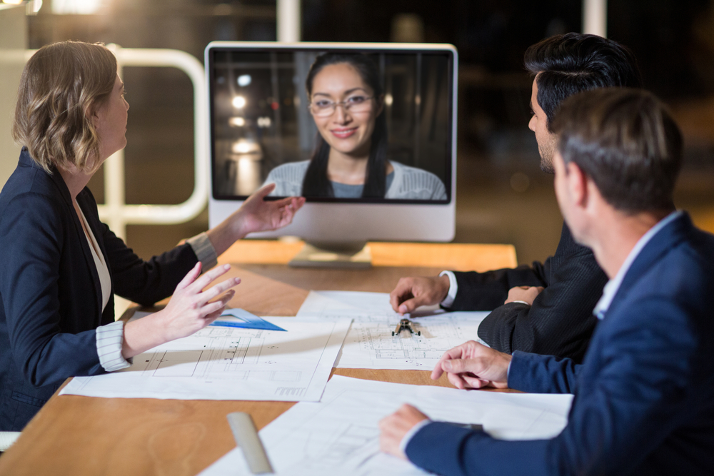 Business team having video conference in the conference room Business team having video conference in the conference room